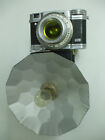 Petit appareil photo argentique LUMIERE équipé de son flash et d’un filtre