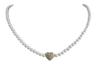 Collana donna perle bianche con cuore o stella in acciaio dorato e zirconi