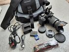 Canon EOS 1100D 12.2MP Digital SLR Camera with Canon EF-S 18-55mm Lens + Bag